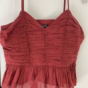 express burnt orange peplum top size medium